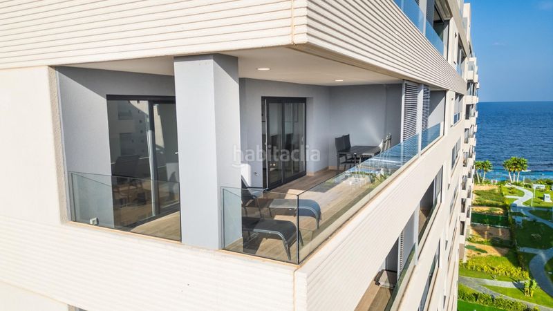 Foto fadbb5fc-83bc-43a5-a41a-47462ad35060. Apartament amb aparcament piscina a Punta Prima Torrevieja
