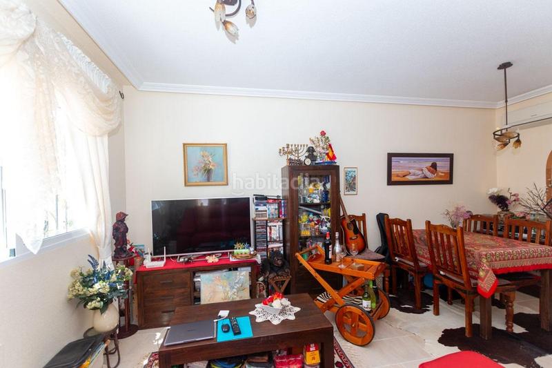 Foto 1afc1a6a-f668-4fcf-9bfb-2377ba4bbc4c. Casa adosada adosado con 2 dormitorios y 2 baños, con piscinas comunitaria en zona villamartin costa en Orihuela