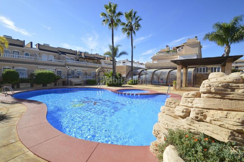 Foto 1b86334e-d22b-4f37-9d7e-494264efe266. Casa adosada adosado con 2 dormitorios y 2 baños, con piscinas comunitaria en zona villamartin costa en Orihuela