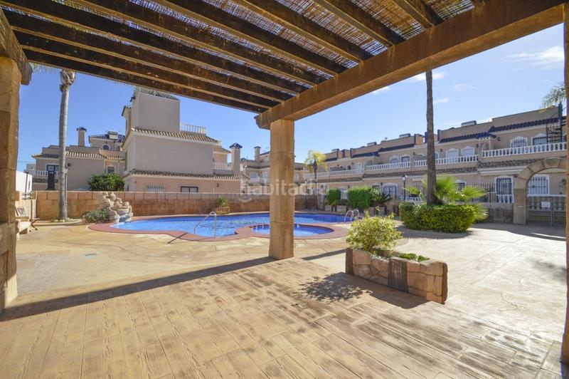 Foto 7ead6038-3e74-4f83-9167-56a3cdbeca1d. Casa adosada adosado con 2 dormitorios y 2 baños, con piscinas comunitaria en zona villamartin costa en Orihuela