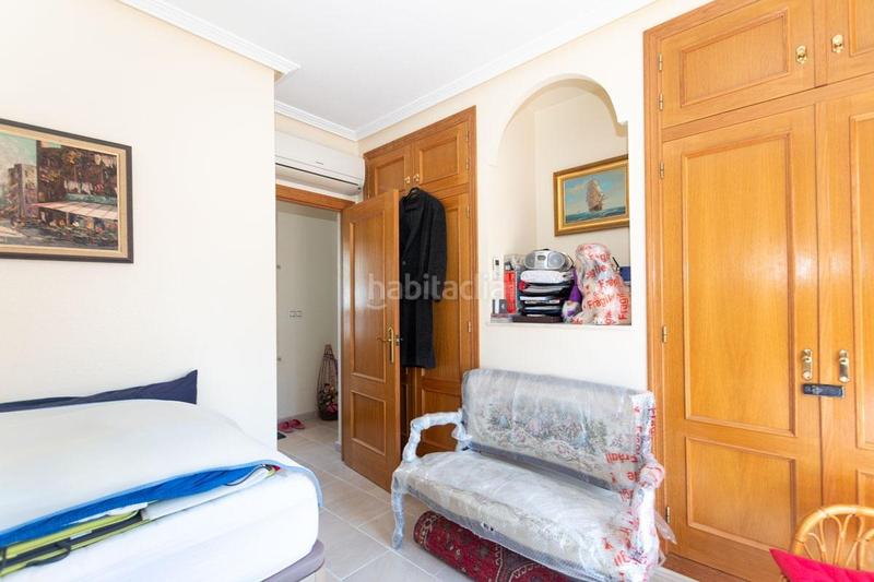Foto c002c0e5-a419-4b75-b223-faaeda1b42bc. Casa adosada adosado con 2 dormitorios y 2 baños, con piscinas comunitaria en zona villamartin costa en Orihuela