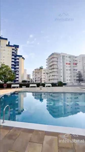 Foto dfd66e4a-4fe9-4a86-80c8-54f44fd0586a. Appartement mit parking pool in Playa de Gandía Gandia