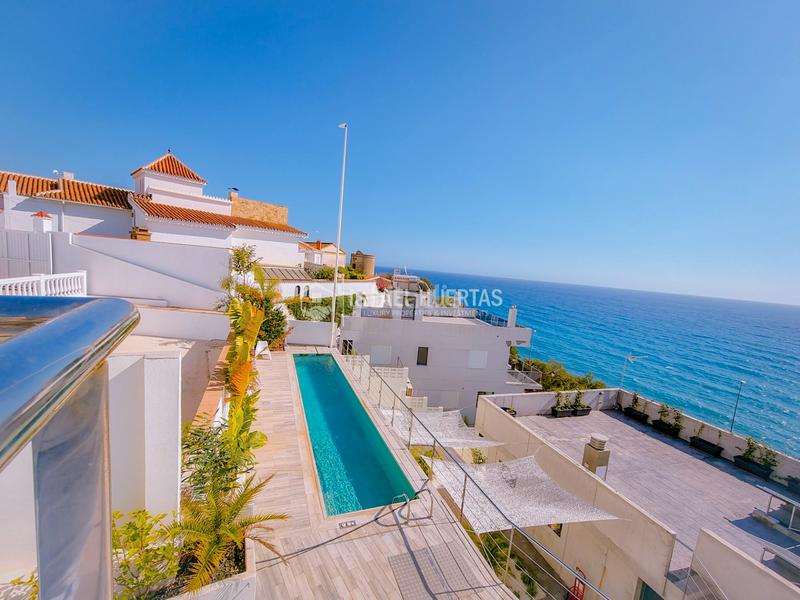 Foto 0b64e0cd-ea07-4e93-82ae-f59a57e9dd81. Casa amb calefacció aparcament piscina a Chaparil - Torrecilla - Punta Lara Nerja