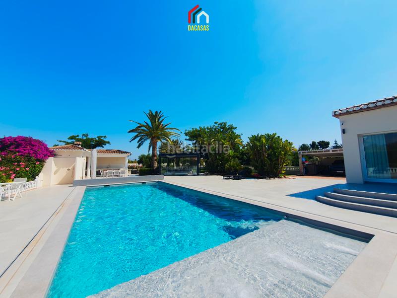 Foto ab1b2d2f-1389-4cbb-9cd2-959bec1f966a. Chalet con camino riscaldamento parcheggio piscina in Dénia