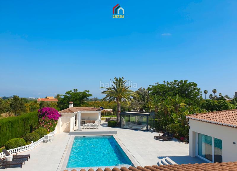 Foto fff0a1a6-e866-4ba5-9571-e5cb1c415a58. Chalet con camino riscaldamento parcheggio piscina in Dénia