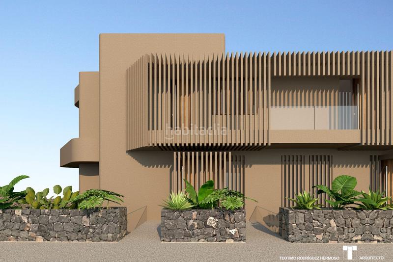 Foto ae6ebf62-5867-4f83-8176-613c44f51627. Casa adosada vida moderna en una zona tranquila en Adeje
