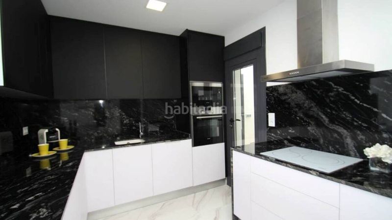 Foto 13be4a3d-98df-4d39-970d-f247d542b9a3. Casa amb piscina a Campoamor Orihuela
