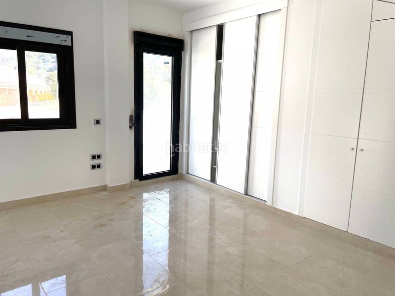 Foto 40be00ed-67ba-467a-bb9a-cbd88d375d5e. Casa amb piscina a Torremuelle Benalmádena