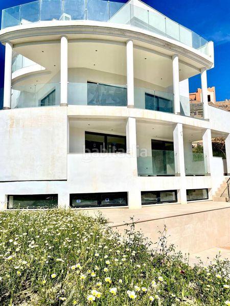 Foto cf1f1751-406b-412d-a924-f68fe20514f6. Casa amb piscina a Torremuelle Benalmádena