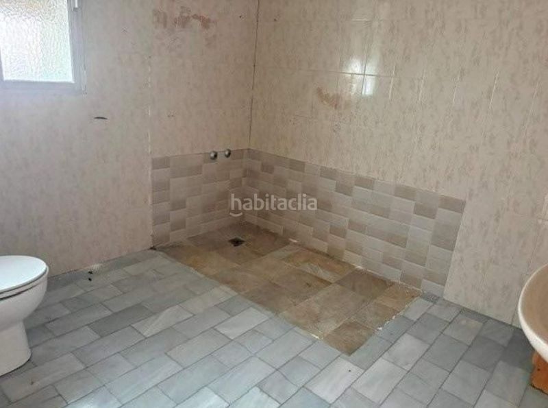 Foto a23d8cd6-7b8f-4619-b0a9-b3dec34abb31. Casa adossada a Umbrete