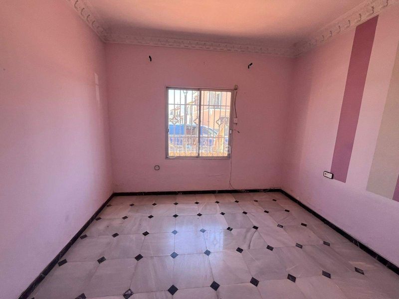 Foto c96fe030-cd27-4689-a769-829b35e53e35. Casa adossada a Umbrete