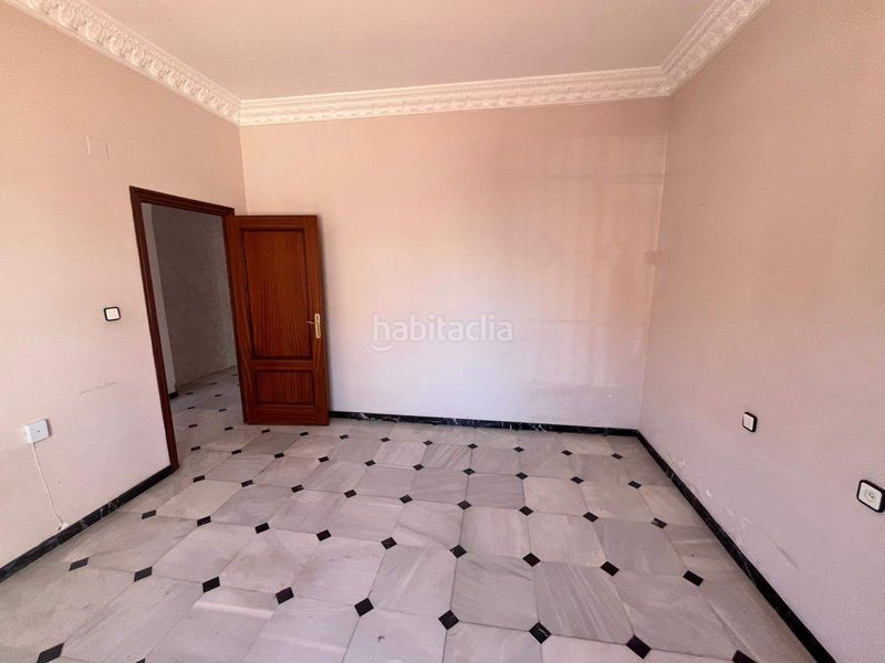 Foto f154b180-43cf-4df5-89ce-27a425585e30. Casa adossada a Umbrete