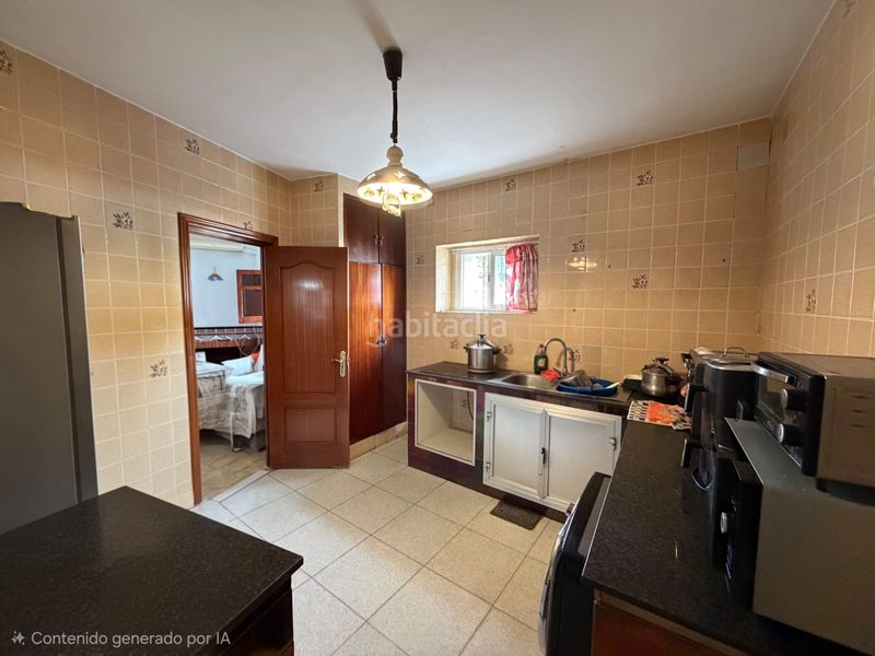 Foto fc22b1e5-926d-4c2c-b3fd-70ed38b8e247. Casa amb aparcament a Burguillos