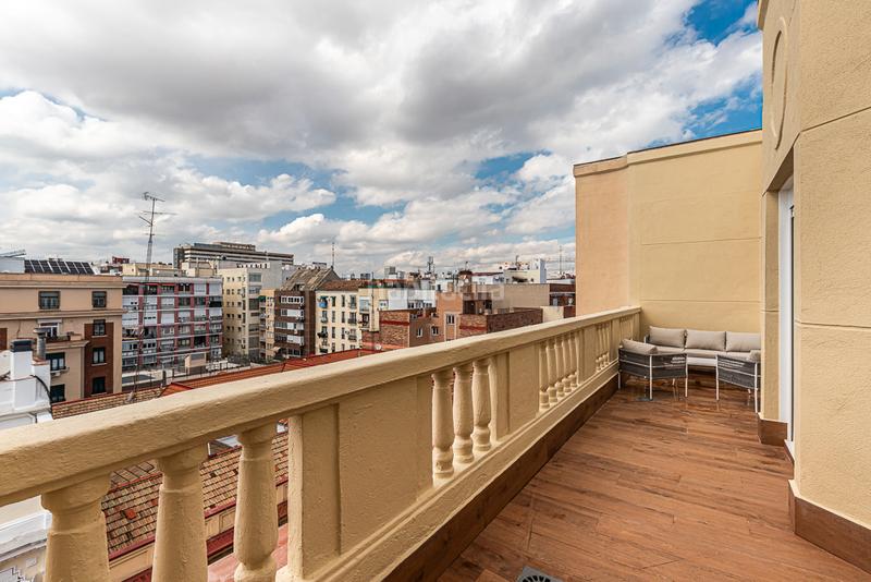 Foto e780c18c-9167-4a5a-9a74-44f363b14035. Appartamento con camino riscaldamento parcheggio in Madrid