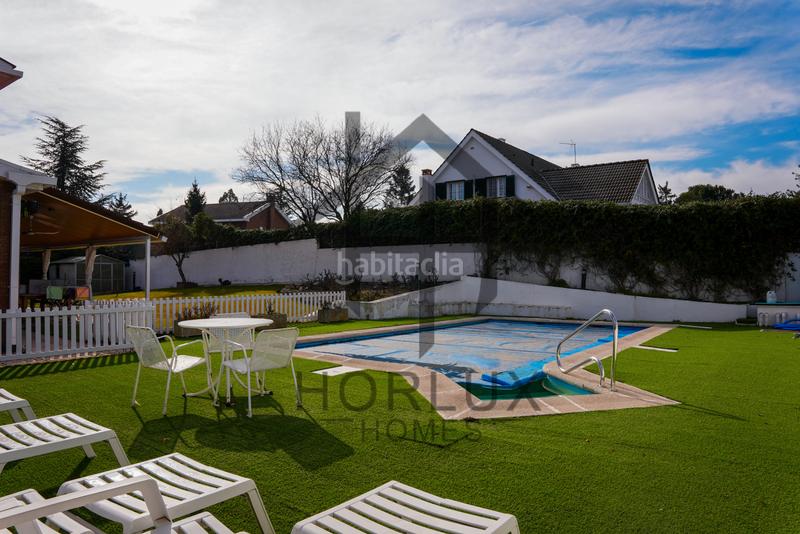 Foto 301f6629-fb34-4671-9a3a-7565e2722b28. Chalet con camino riscaldamento parcheggio piscina in Pozuelo de Alarcón