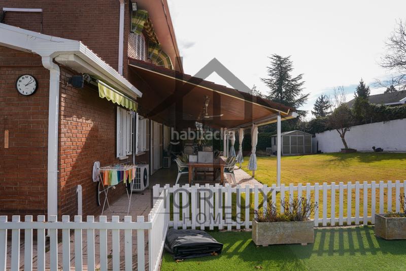 Foto 9c6d138f-3529-404d-a726-e30316b8b291. Chalet con camino riscaldamento parcheggio piscina in Pozuelo de Alarcón