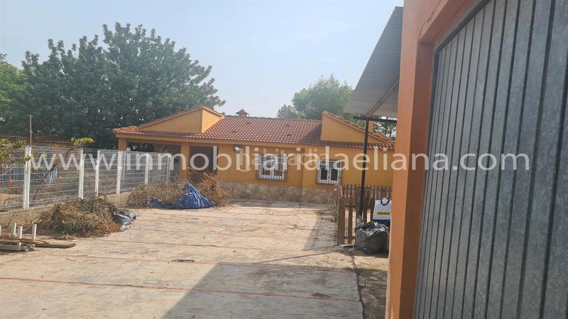 Foto 0686553e-ed1f-4018-9ac4-ac2f64885d2c. Chalet avec parking piscine dans Urbanizaciones Llíria