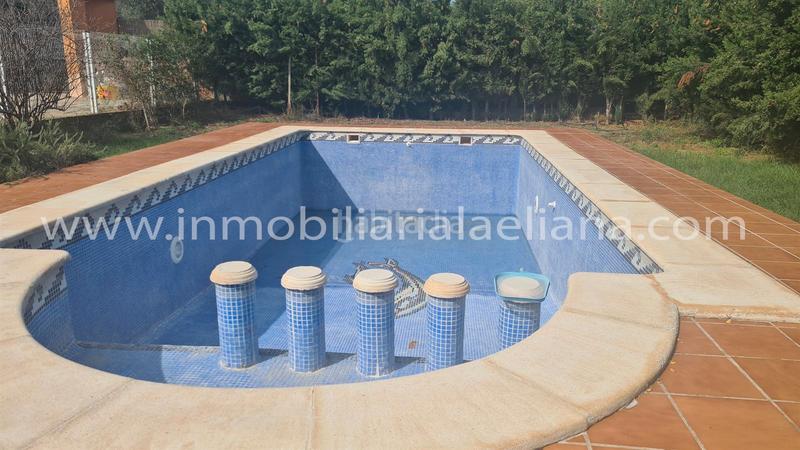 Foto 8b9e98ae-8b79-4c64-983a-533b9f8dc928. Chalet avec parking piscine dans Urbanizaciones Llíria