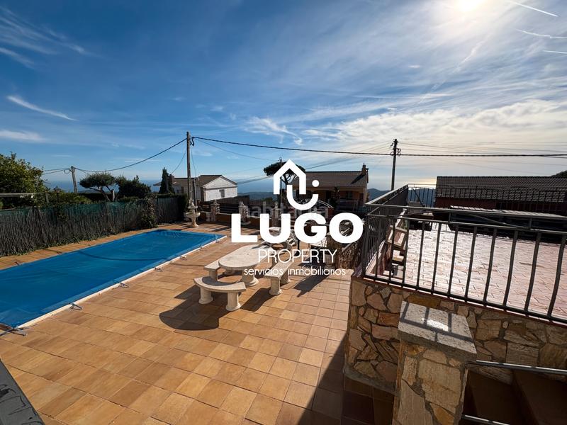 Foto 1537c76d-0c65-4967-bf47-564baf57bd22. Maison avec cheminée piscine dans Sant Iscle de Vallalta