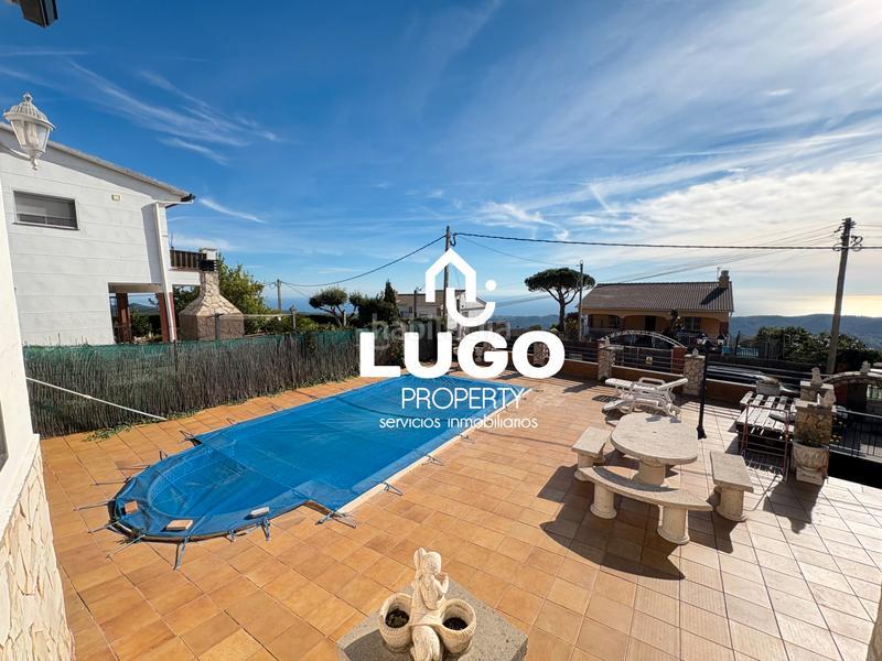 Foto 9063416d-dd2b-4cc0-bb5f-8f6e0f53729d. Maison avec cheminée piscine dans Sant Iscle de Vallalta