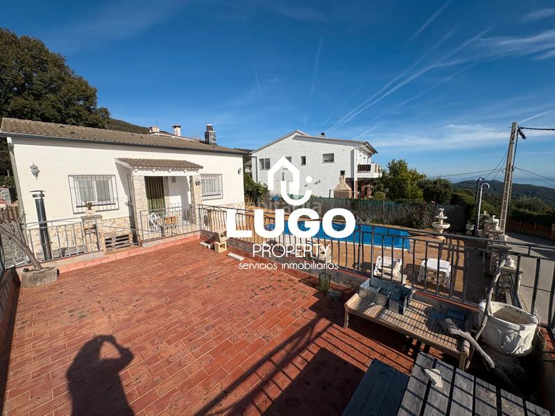 Foto c0c5795c-0d00-47d8-85d6-565414d4c9af. Maison avec cheminée piscine dans Sant Iscle de Vallalta