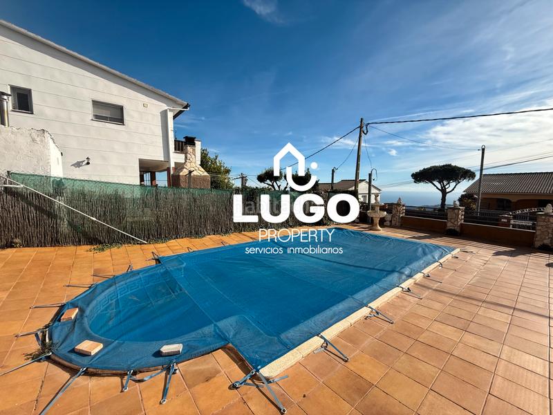 Foto d97aa3e5-6d19-4840-939f-3c7094c1575e. Maison avec cheminée piscine dans Sant Iscle de Vallalta