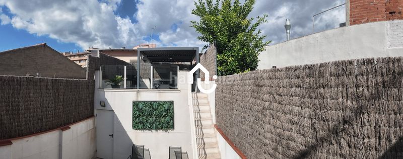 Foto 461233f5-f7b6-4e2c-865a-a313c2a01de6. Casa adossada amb aparcament a Roc Blanc Terrassa