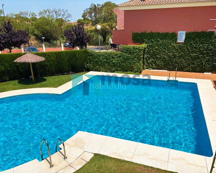 Foto 578ba43a-cf2e-4fa3-819e-b30dc45c7757. Maison jumelée avec parking piscine dans Islantilla golf Islantilla