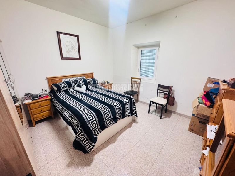 Foto 5be9cf0d-f584-4459-a20a-a63ce85100e2. Casa aparellada amb calefacció aparcament a Gálvez