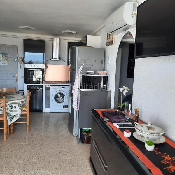 Foto e7da1ff0-b404-4c5b-9420-69d68ce0ae1e. Apartamento en muga-delta 9 apartamento renovado en 1a línea en Empuriabrava