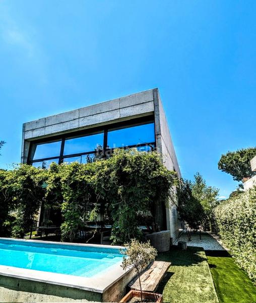 Foto 6557c40e-ec84-45df-9a13-9762e8028432. Casa con camino riscaldamento parcheggio piscina in Pozuelo de Alarcón