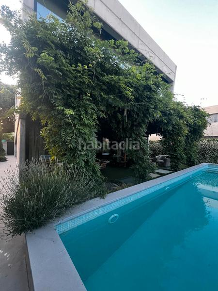 Foto e4de5fd7-7840-4e3b-bdd3-408bbad8eebe. Casa con camino riscaldamento parcheggio piscina in Pozuelo de Alarcón