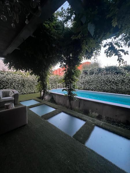 Foto f6b3d2f3-e220-402e-95cb-4d2d693182ed. Casa con camino riscaldamento parcheggio piscina in Pozuelo de Alarcón