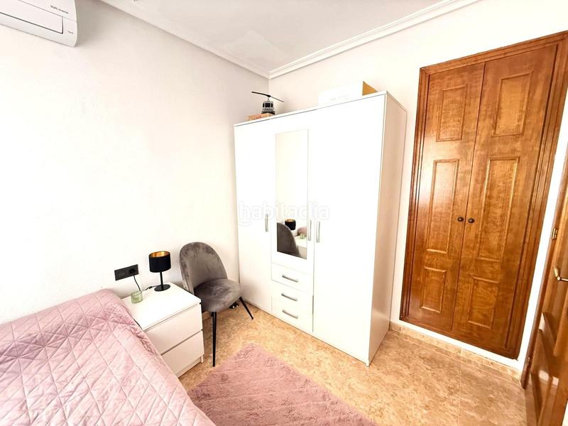 Foto 073f5812-2979-4a2b-bd85-c0c5d626dd4d. Casa pareada casa adosada esquinera de 3 dormitorios con su parking y piscina en villamartin en Orihuela