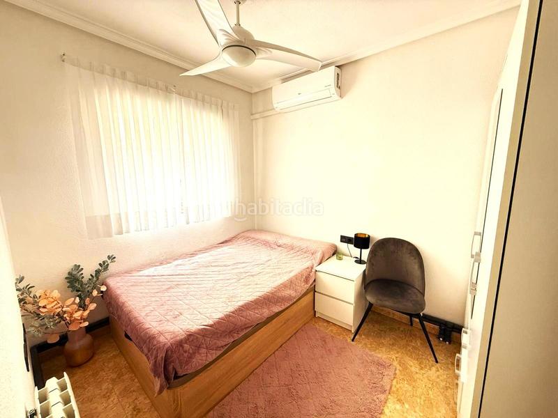 Foto b5e6dd43-1247-41d7-830e-85d0dc5d7845. Casa pareada casa adosada esquinera de 3 dormitorios con su parking y piscina en villamartin en Orihuela