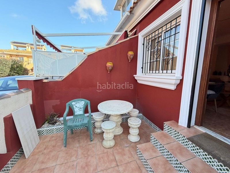 Foto 0df52e8a-4ba9-4a58-96d2-5f2362ad847e. Casa aparellada amb aparcament piscina a Villamartín-Las Filipinas Orihuela