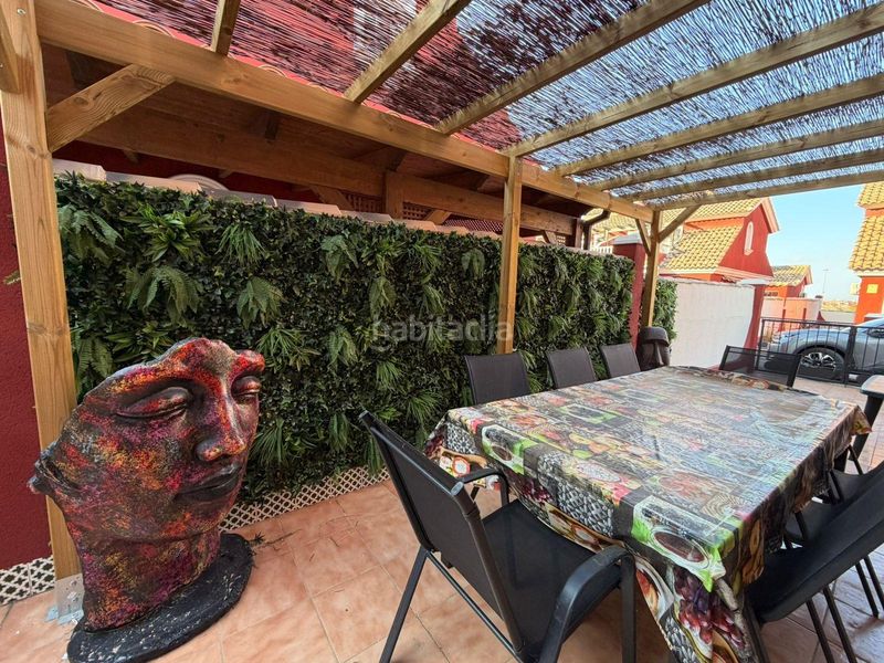 Foto 79d71765-408d-4f2b-b8b9-907eedff287f. Casa aparellada amb aparcament piscina a Villamartín-Las Filipinas Orihuela