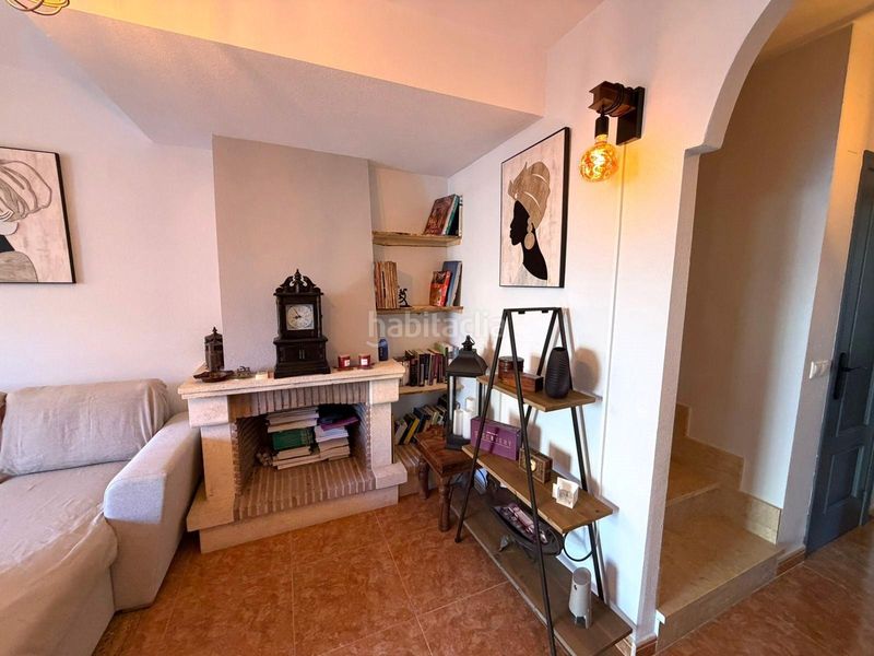 Foto f5bb5f62-a08c-4690-ab70-60c1bf4a2309. Casa aparellada amb aparcament piscina a Villamartín-Las Filipinas Orihuela