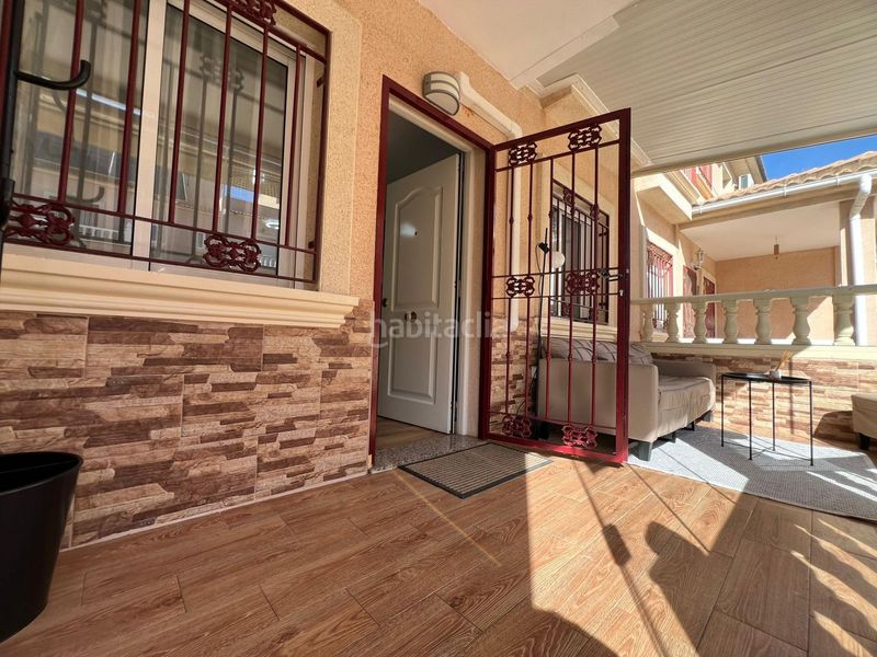 Foto 493c9281-3e21-49a5-b457-0b08a924355f. Casa adossada amb aparcament piscina a Playa Flamenca Orihuela