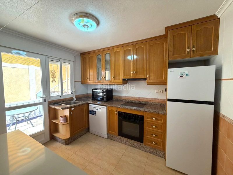 Foto 921ac9fd-7bd9-400e-800c-3622f0035a59. Maison jumelée avec parking piscine dans Los Balcones-Los Altos Torrevieja