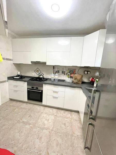 Foto 8f5c90bf-81c3-4ea1-9e78-8a929aa4dd9d. Casa aparellada amb piscina a Playa Flamenca Orihuela