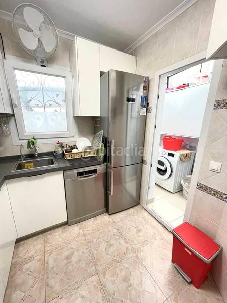 Foto dabfa892-18ed-4e4e-a51f-ac3f78596d22. Casa aparellada amb piscina a Playa Flamenca Orihuela