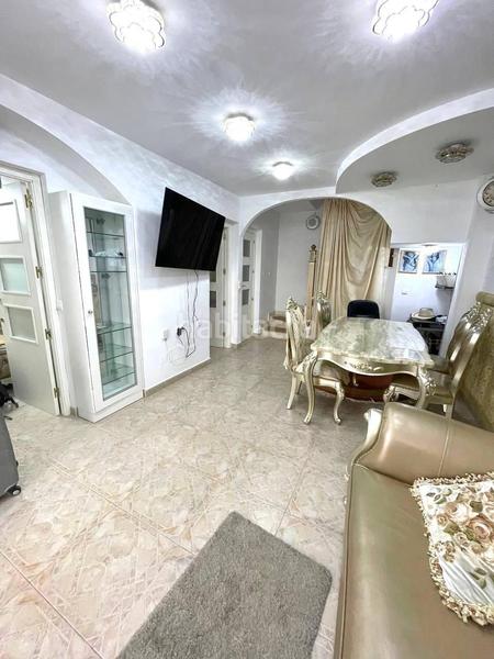 Foto dd85fb2c-2209-4f3b-9a09-51a660ed565a. Casa aparellada amb piscina a Playa Flamenca Orihuela