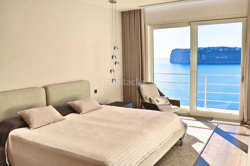 Foto 3d92aaa8-018d-43e0-ae0d-53cd5efb6cc6. Casa sunset villa in first sea line in cala llamp - puerto en Andratx