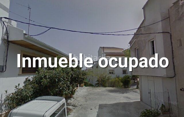 Foto 15f8e109-23c3-4bfc-8b24-774894209d60. Casa adossada a Vélez - Rubio