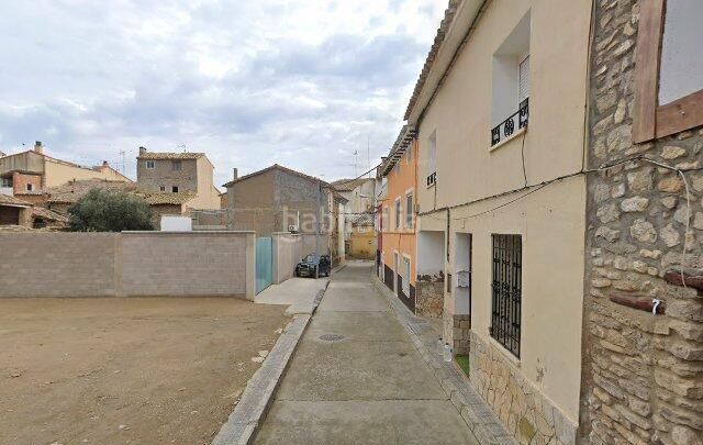 Foto f346faf1-7508-444e-9c9a-0e9a3de176be. Casa adossada amb aparcament a Lanaja