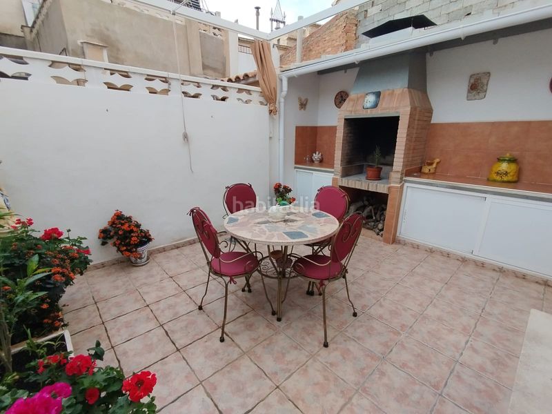 Foto f5e74da6-d6b7-493e-b84d-f850e8190824. Casa adossada amb aparcament a Aigües