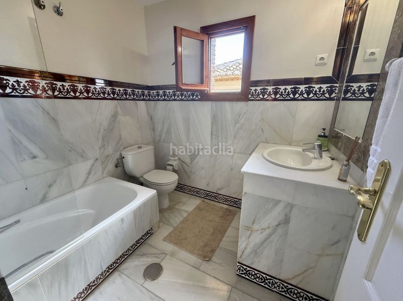 Foto 734117a9-eddf-4e3a-ba3d-82db8a9495d6. Casa aparellada amb xemeneia piscina a Mijas golf Mijas