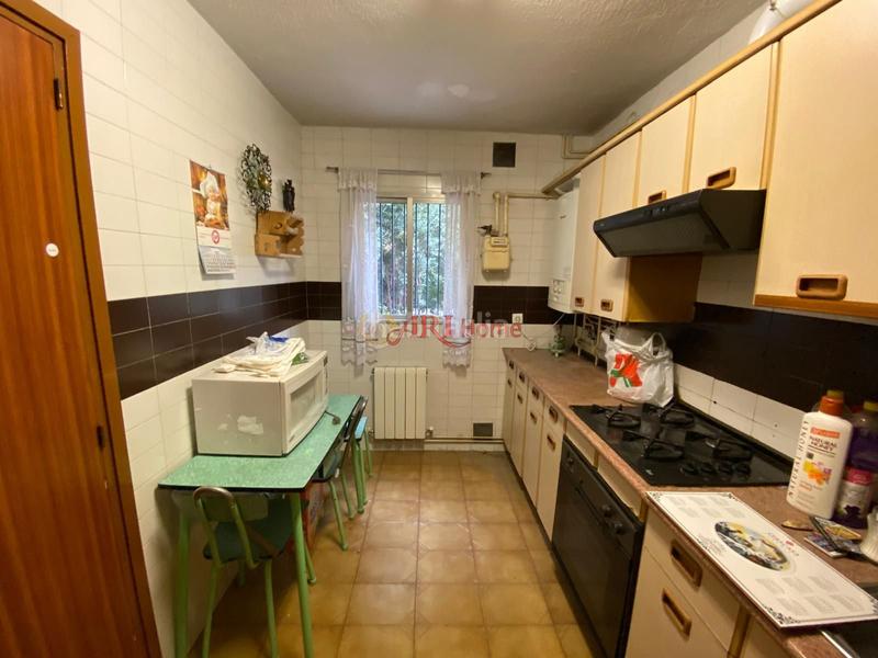 Foto b24be061-b43b-49c0-9de6-2a1f776e4aaf. Maison jumelée avec chauffage dans Orcasitas Madrid