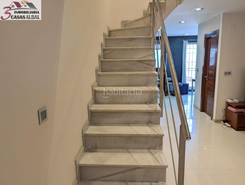 Foto 8a83f9a7-a9ee-4929-adb1-8f4f36131e13. Casa adossada amb aparcament a Albal